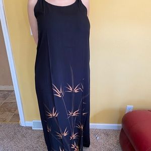 Sleeveless black and brown dress.